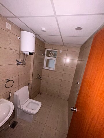 Bathroom in 3 BHK Apartment at Tata Eureka Park, Sector 150 – for Sale