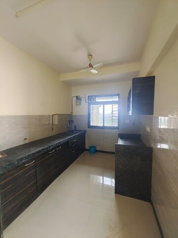 Kitchen in 4 BHK Apartment at Acme Ozone, Manpada – for Sale