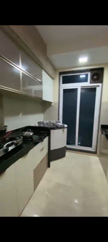 Kitchen in 2 BHK Apartment at Dreamax Vega, Andheri East – for Rent