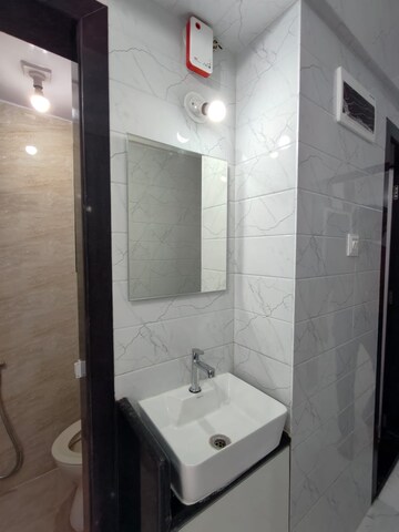 Bathroom in 1 BHK Apartment at Kachnar CHS Vasant Vihar, Vasant Vihar – for Rent