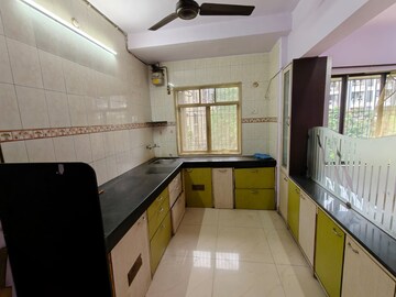 Kitchen in 2 BHK Apartment at Lok Vruksha Phase I, Kapur Bawdi – for Rent