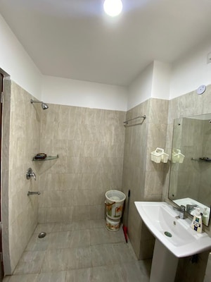 Bathroom in 3 BHK Apartment at Great Value Sharanam, Sector 107 – for Sale
