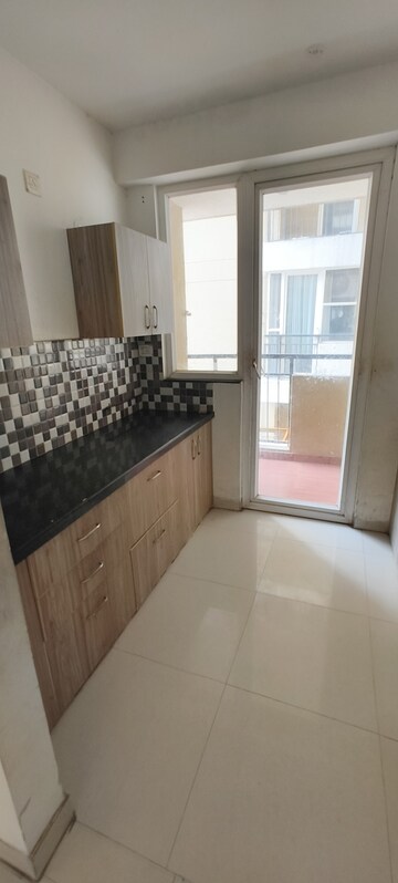 Kitchen in 3 BHK Apartment at Anukampa Platina Terraces, Mansarovar – for Rent