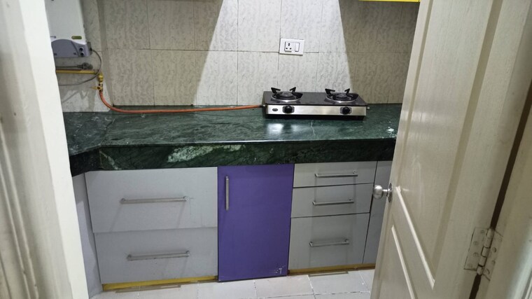 Kitchen, paras-tierea 2 Bedroom 925 Sq.Ft. Apartment In Sector 137 Noida 9190369