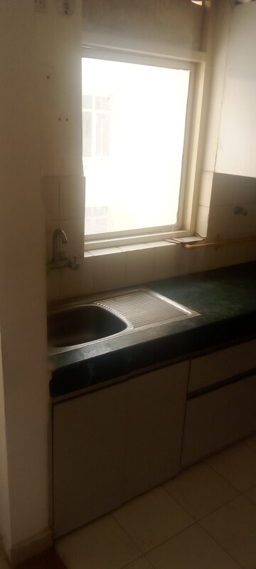 Kitchen in 2 BHK Apartment at Parker White Lily, Sector 8 – for Rent