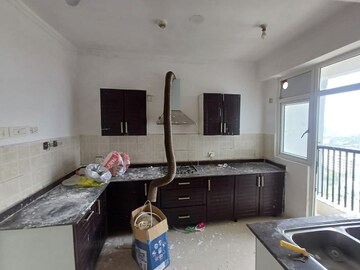 Kitchen in 3 BHK Apartment at Amrapali Platinum, Sector 119 – for Sale