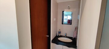 Bathroom in 3 BHK Apartment at Paranjape Schemes Crystal Towers, Pashan – for Rent