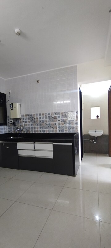 Kitchen in 2 BHK Apartment at Nanded City Pancham, Nanded – for Rent