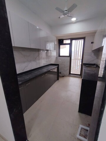 Kitchen in 3 BHK Apartment at Naman Habitat, Andheri West – for Rent
