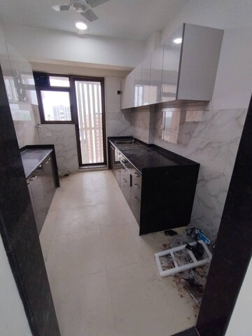 Kitchen in 3 BHK Apartment at Naman Habitat, Andheri West – for Rent