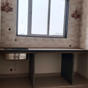 Kitchen in 1 BHK Apartment at Yesu Anand Residency, Kalyan Shilphata Road – for Sale