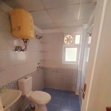 Bathroom in 2.5 BHK Apartment at Gardenia Golf City, Noida Central – for Rent