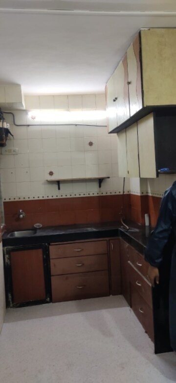 Kitchen in 1 BHK Apartment at Lokpuram CHS, Vasant Vihar – for Sale