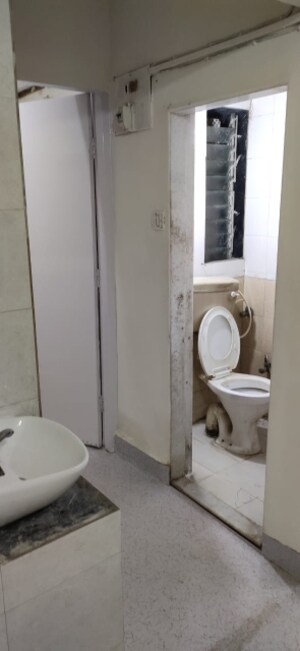Bathroom in 1 BHK Apartment at Lokpuram CHS, Vasant Vihar – for Sale