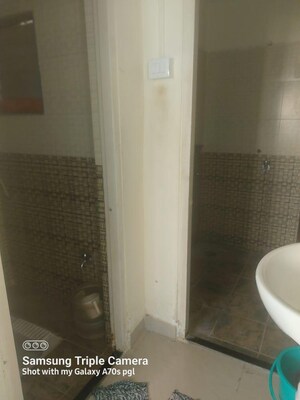 Bathroom in 1 BHK Apartment at Mhada Colony – for Sale