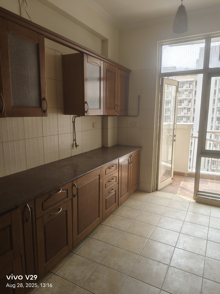 Kitchen, central-park-i 3 Bedroom 1950 Sq.Ft. Apartment In Sector 42 Gurgaon 9191151