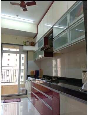 Kitchen in 2 BHK Apartment at Rustomjee Azziano Wing E, Thane West – for Sale