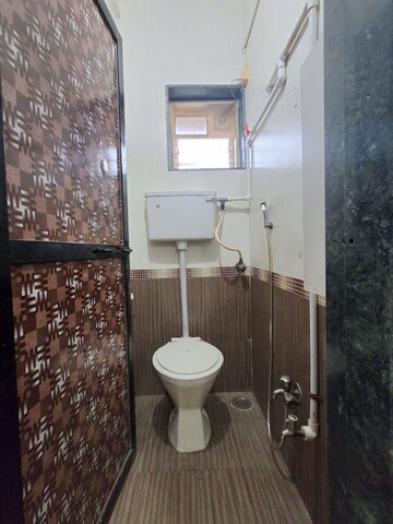 Bathroom in 1 BHK Apartment at Kopar Khairane – for Rent