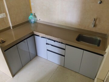 Kitchen in 1.5 BHK Apartment at Dosti West County, Balkum Pada – for Rent