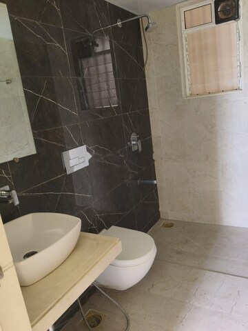 Bathroom in 1.5 BHK Apartment at Dosti West County, Balkum Pada – for Rent