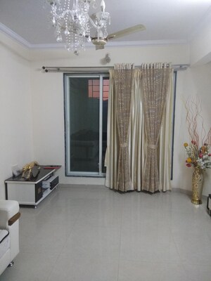 Living Room in 1 BHK Apartment at Puraniks One Hometown, Ghodbunder Road – for Sale
