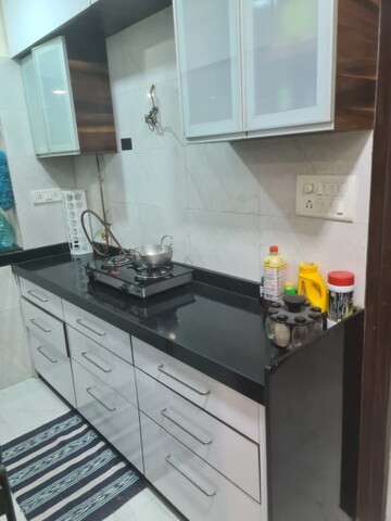 Kitchen in 3 BHK Apartment at Awesome Heights, Andheri East – for Rent