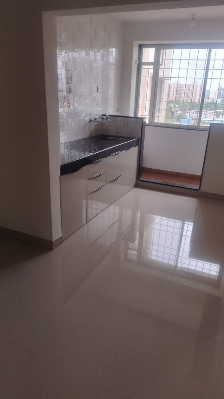 Kitchen, eden-garden-tathawade 2 Bedroom 851 Sq.Ft. Apartment In Tathawade Pune 9191741