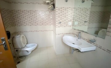 Bathroom in 3 BHK Apartment at ATS Golf Meadows, Central Derabassi – for Rent