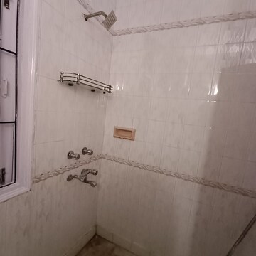 Bathroom in 3.5 BHK Builder Floor at Nehru Enclave – for Rent