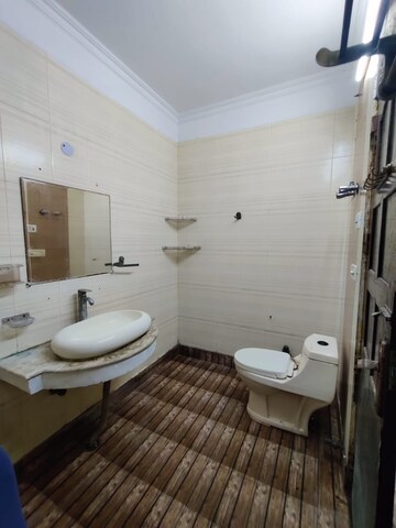 Bathroom in 3 BHK Builder Floor at Green Fields Colony – for Rent