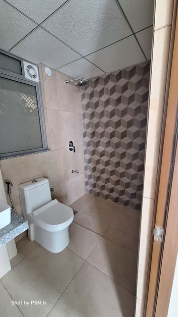 Bathroom in 1 BHK Apartment at Raymond Ten X Vibes, J K Gram – for Rent