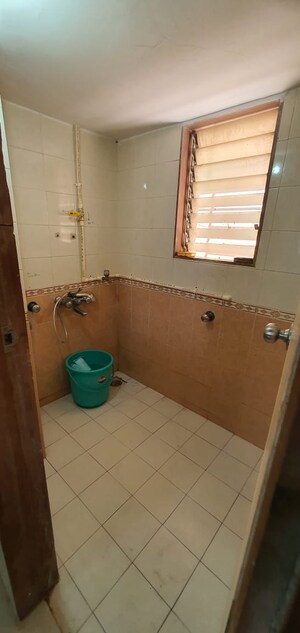 Bathroom in 2 BHK Apartment at Teerth Plaza, Mira Road – for Sale