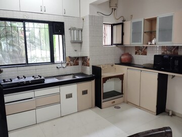 Kitchen in 2 BHK Apartment at Krishna Kamal, Pashan Sus Road – for Rent