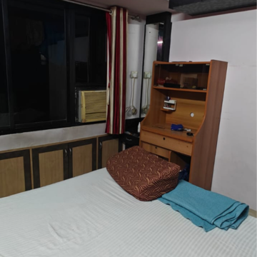 Living Room in 1 BHK Apartment at Shubh Heights, Tilak Nagar – for Rent
