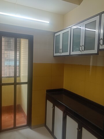 Kitchen in 2 BHK Apartment at Arkade Vineet Apartments, Kandivali West – for Rent