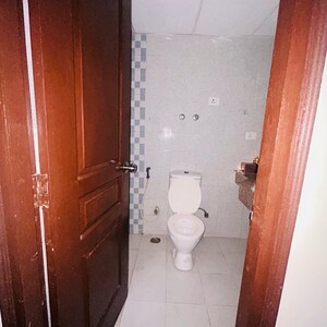 Bathroom in 2 BHK Apartment at Logix Blossom Greens, Sector 143 – for Sale