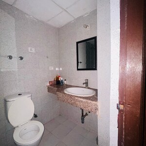 Bathroom in 2 BHK Apartment at Logix Blossom Greens, Sector 143 – for Sale