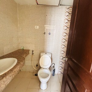 Bathroom in 2 BHK Apartment at Logix Blossom Greens, Sector 143 – for Sale