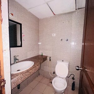 Bathroom in 2 BHK Apartment at Logix Blossom Greens, Sector 143 – for Sale