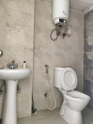 Bathroom in 3 BHK Apartment at Spring Meadows, Tech Zone 4 Greater Noida – for Rent