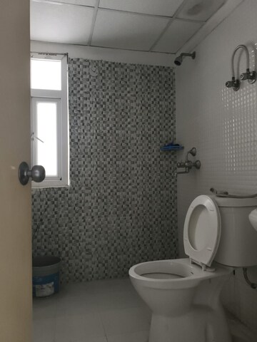 Bathroom in 3 BHK Apartment at Spring Meadows, Tech Zone 4 Greater Noida – for Rent