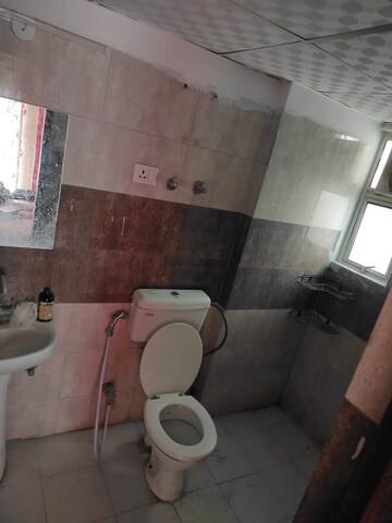 Bathroom in 3 BHK Apartment at Panchsheel Greens II, Sector 16 Greater Noida – for Rent