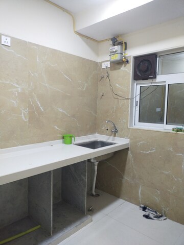 Kitchen in 2 BHK Apartment at Hirani Skyview Castle, Kurla – for Rent