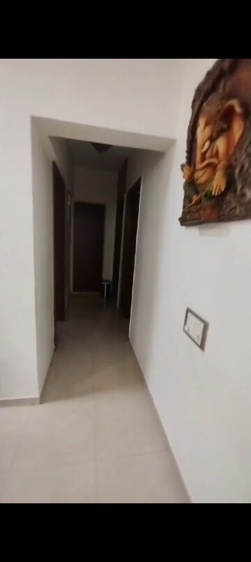 Building Lobby in 3 BHK Apartment at RNA Heights, Andheri East – for Rent