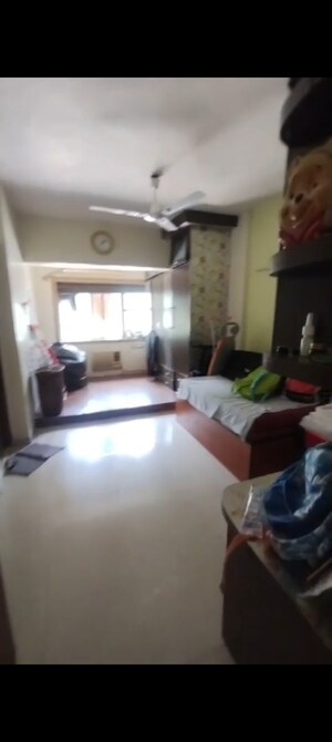 Living Room in 3 BHK Apartment at RNA Heights, Andheri East – for Rent