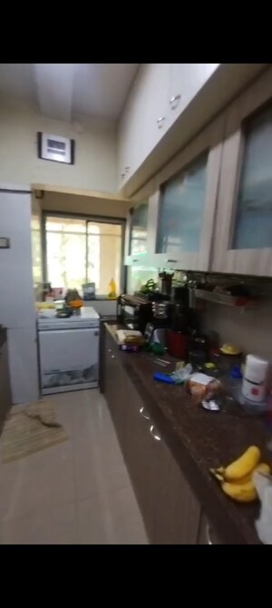 Kitchen in 3 BHK Apartment at RNA Heights, Andheri East – for Rent