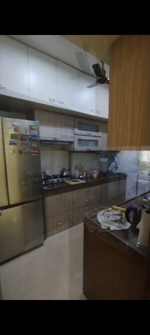 Kitchen in 3 BHK Apartment at RNA Heights, Andheri East – for Rent