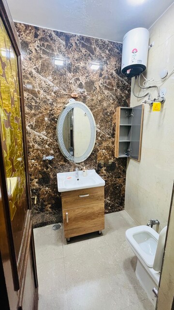 Bathroom in 3 BHK Builder Floor at Kalkaji – for Rent
