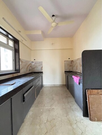 Kitchen in 2 BHK Apartment at Siddhi Highland Park, Kolshet Road – for Rent