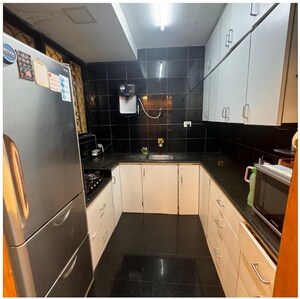 Kitchen in 3 BHK Apartment at Crystal Avenue Andheri West, Andheri West – for Sale